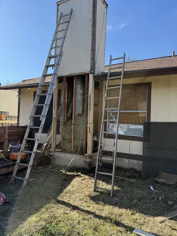 Roof repair and chimney rebuild completed by Texas Professional Roofing