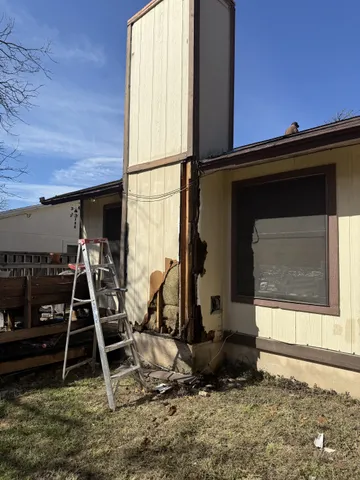 Roof repair and chimney rebuild completed by Texas Professional Roofing